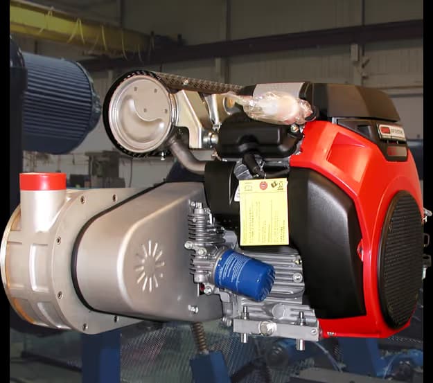 A powerful Sonic Air Systems centrifugal blower driven by a red and black industrial gas engine on a blue steel frame.