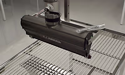 A metal-framed machine with a hose, identified as an ION Air Knife for static neutralizing applications.